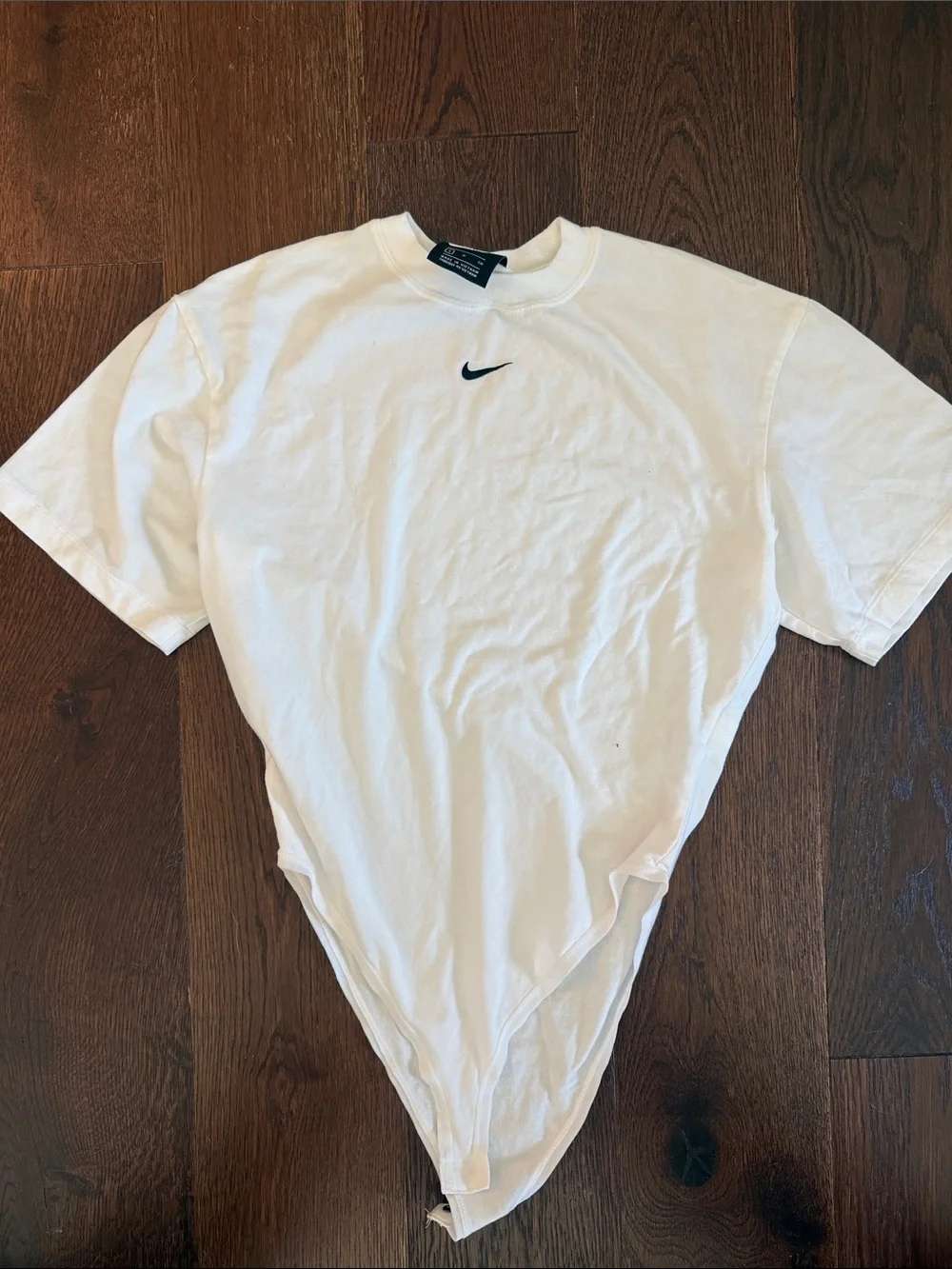Nike White Short-Sleeve Crew with Black Swoosh bodysuit